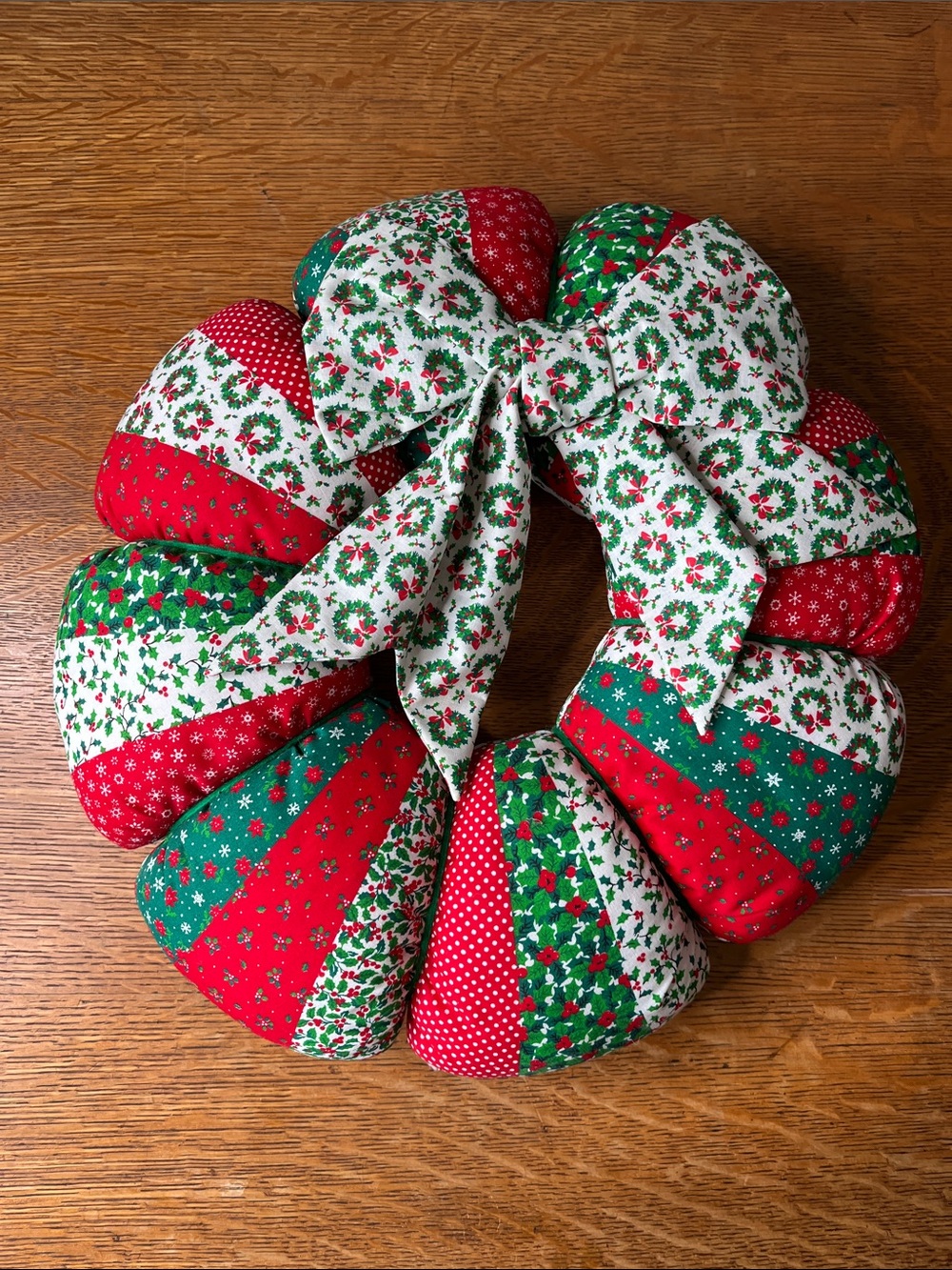 Handmade Christmas Wreath Red Green White Patchwork look fabric. Holiday decor